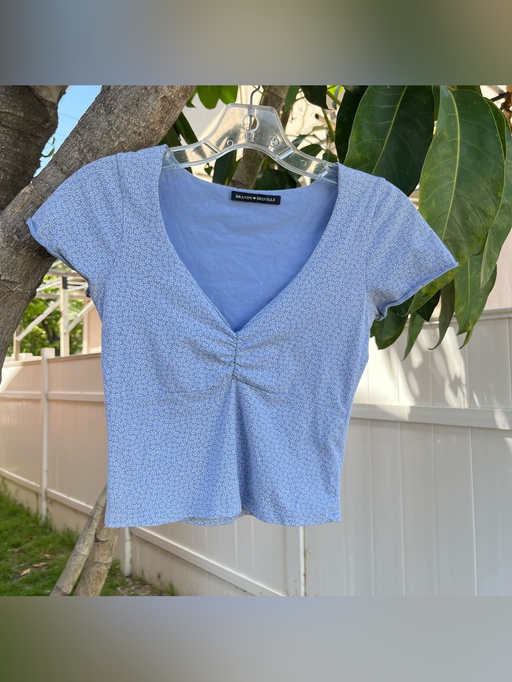 Brandy Melville Light Blue Crop Top with White Floral Detailing!